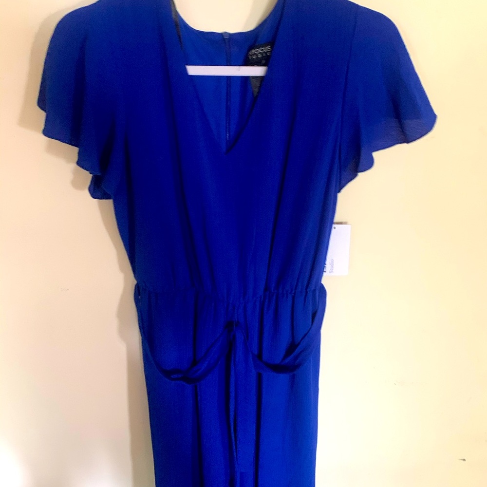 NWT Blue Jumper with Pockets sz. 6